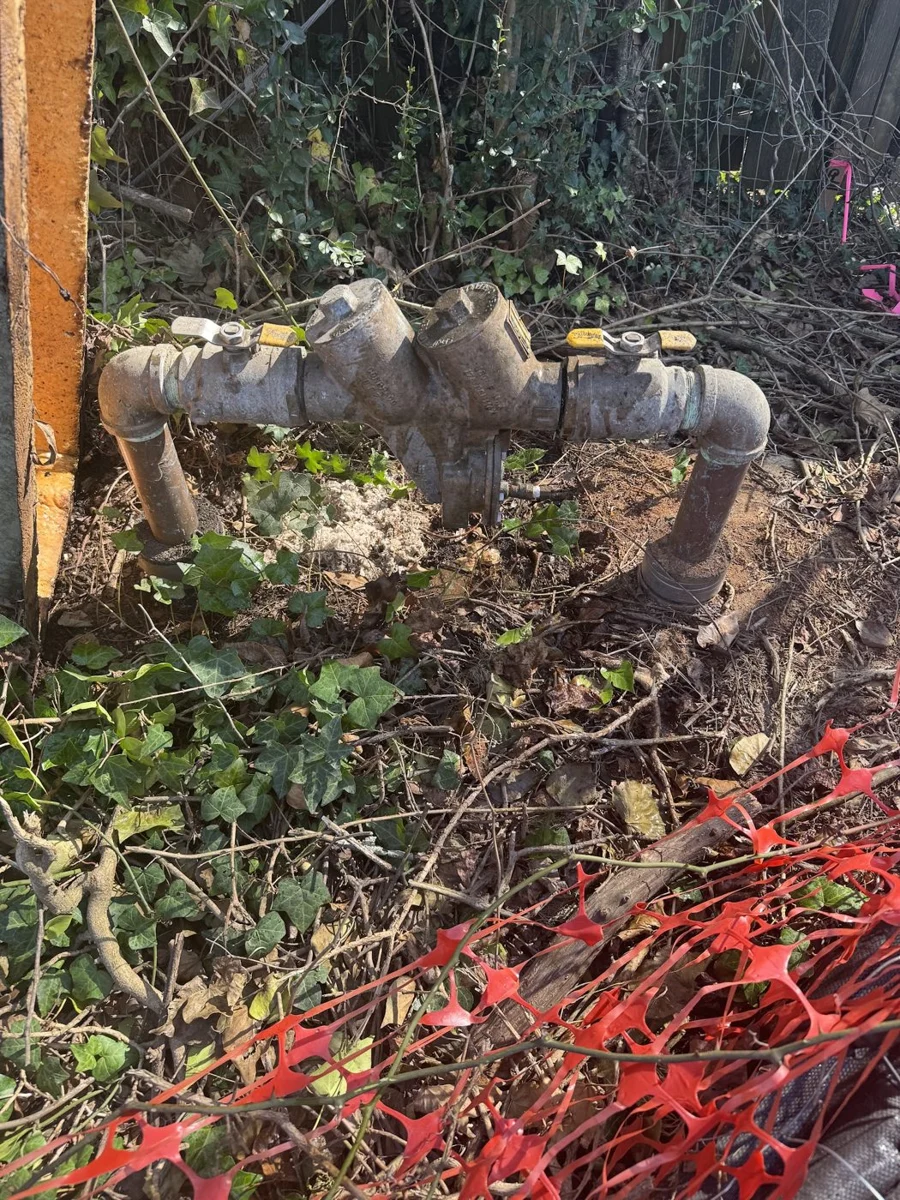Outdoor backflow pipework